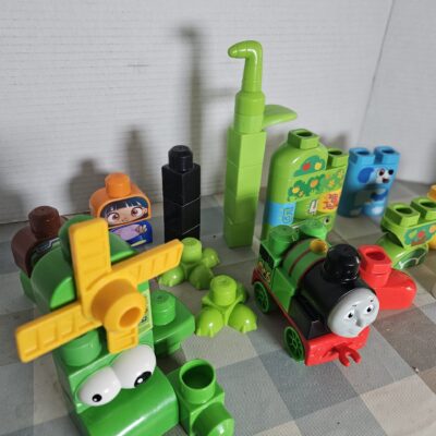 Bag of 100 Mega Bloks + Green themed blocks pictured