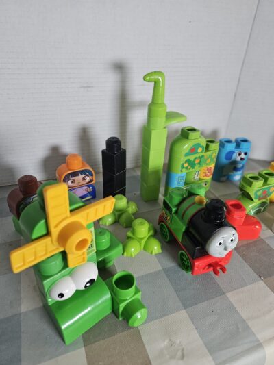 Bag of 100 Mega Bloks + Green themed blocks pictured