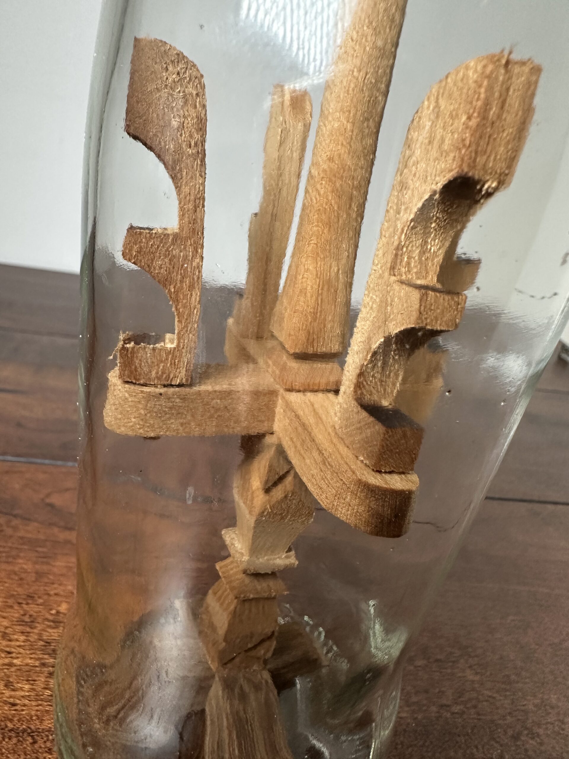 Unique Decorative Ship in a Bottle with Wooden Sculptures - product image 4