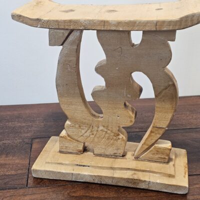 Handcrafted Wooden Stool with Intricate Carved Design - product image 1