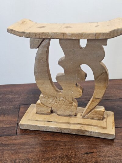 Handcrafted Wooden Stool with Intricate Carved Design - product image 1