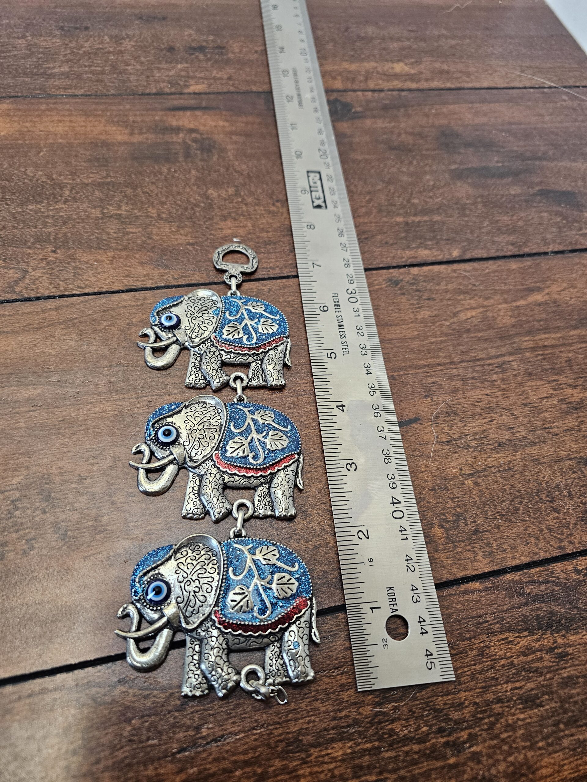Handcrafted Metal Elephant Wall Hanging Decor with Blue Accents - product image 2