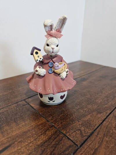 Decorative Bunny Figurine with Birdhouse and Basket - product image 1