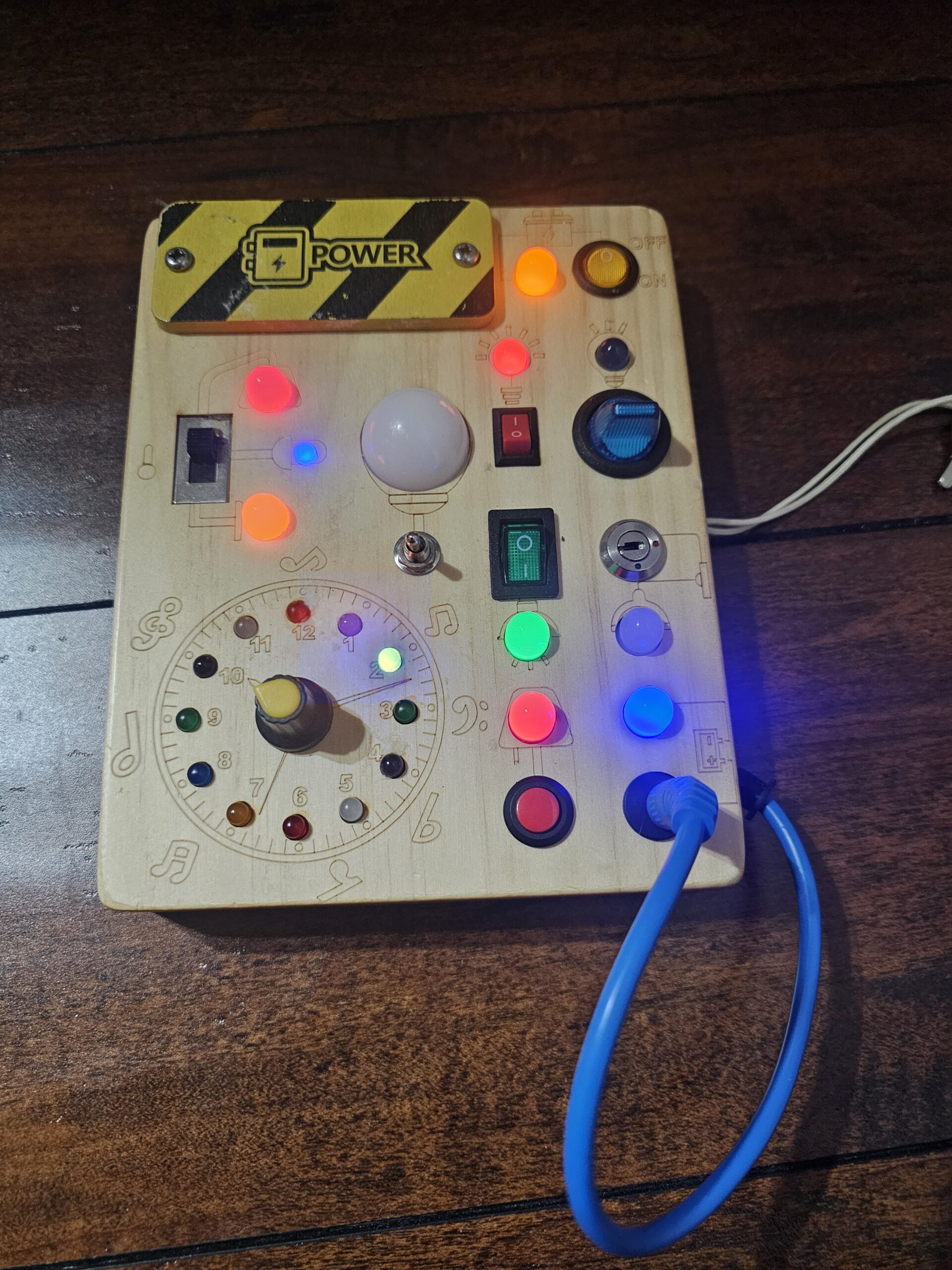 Wooden Busy Board with Lights and Switches for Kids - product image 2