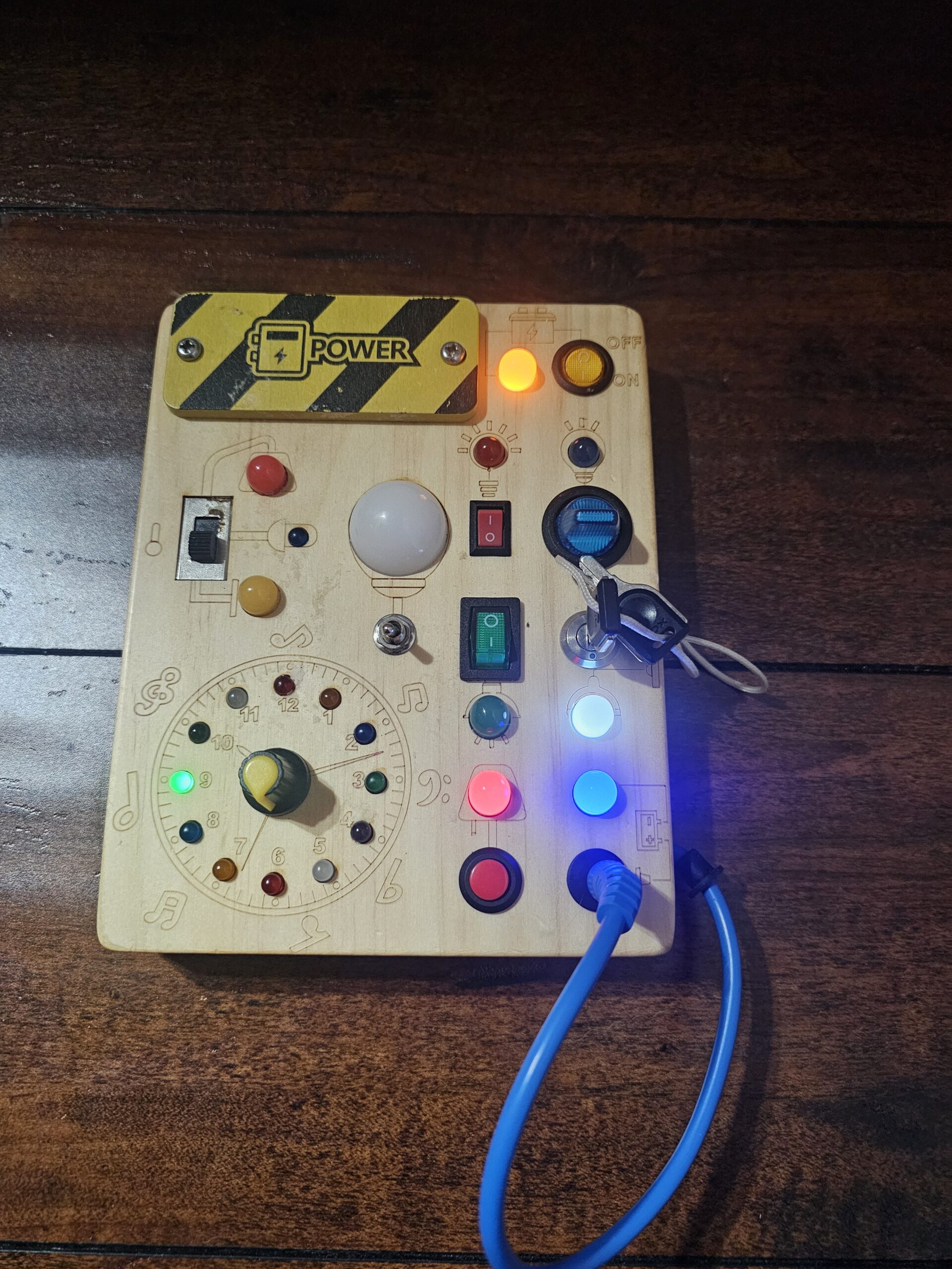 Wooden Busy Board with Lights and Switches for Kids - product image 3