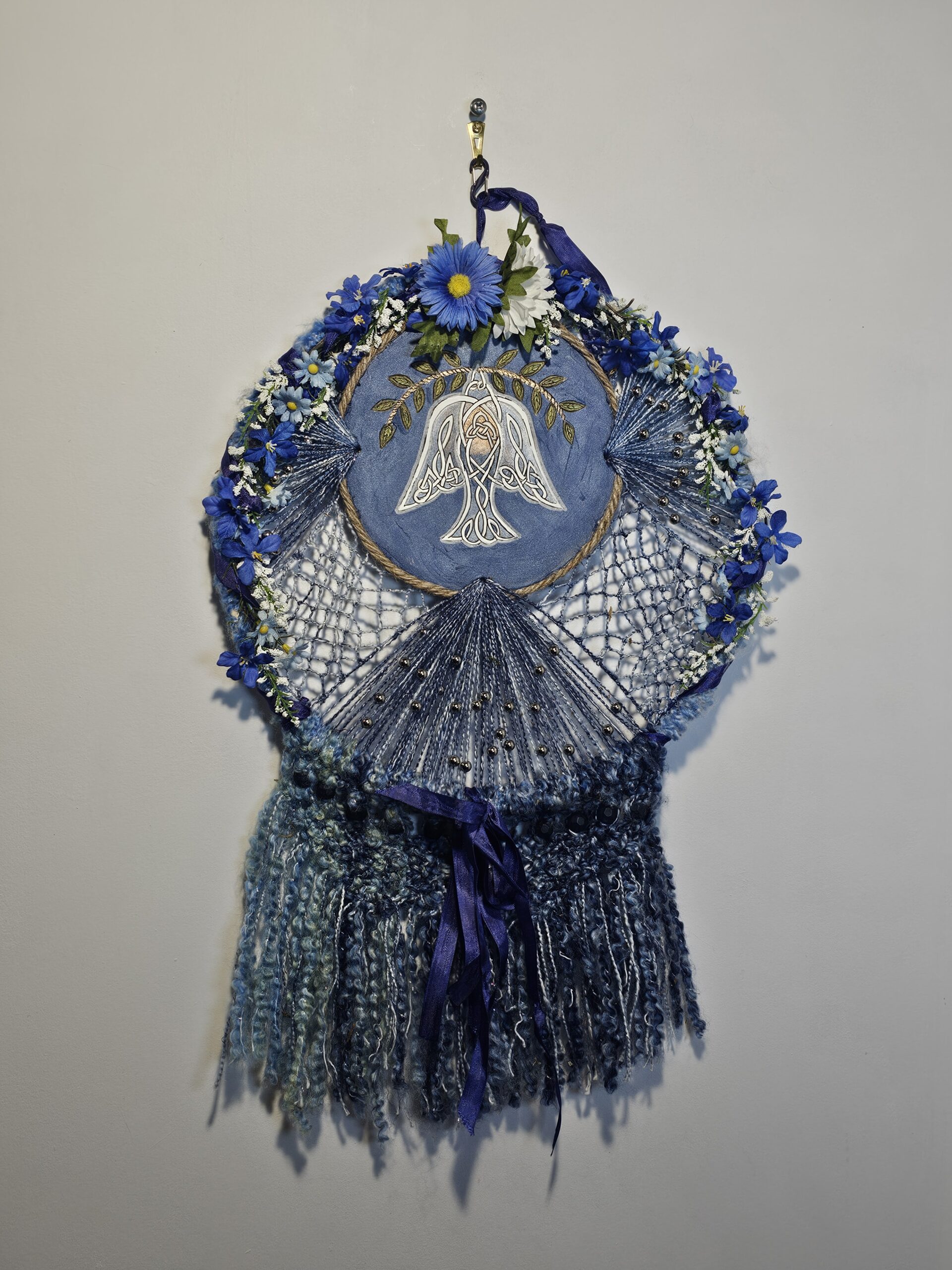 Handcrafted Celtic Knot Dreamcatcher with Floral Accents - product image 1