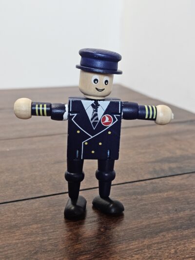 Wooden Pilot Figure Toy with Movable Arms - Collector's Item - product image 1