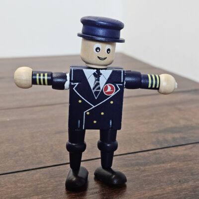 Wooden Pilot Figure Toy with Movable Arms - Collector's Item - product image 1