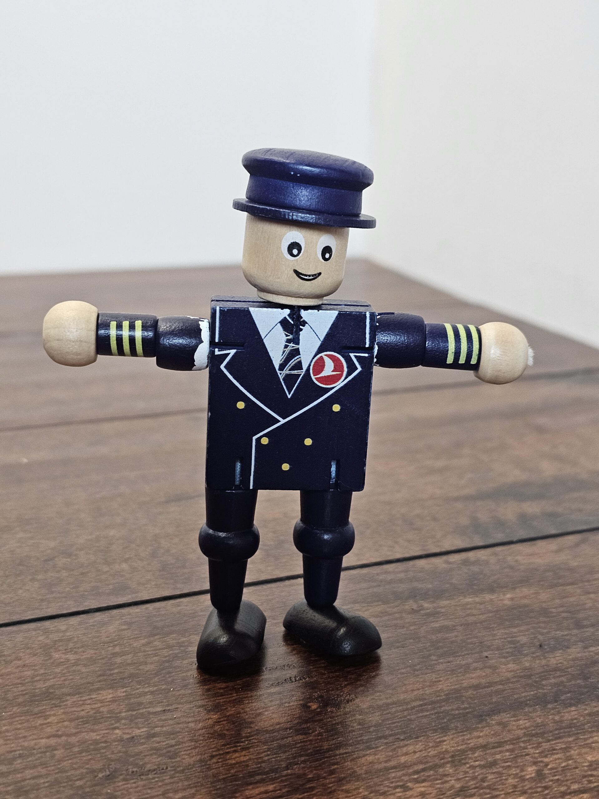 Wooden Pilot Figure Toy with Movable Arms - Collector's Item - product image 1