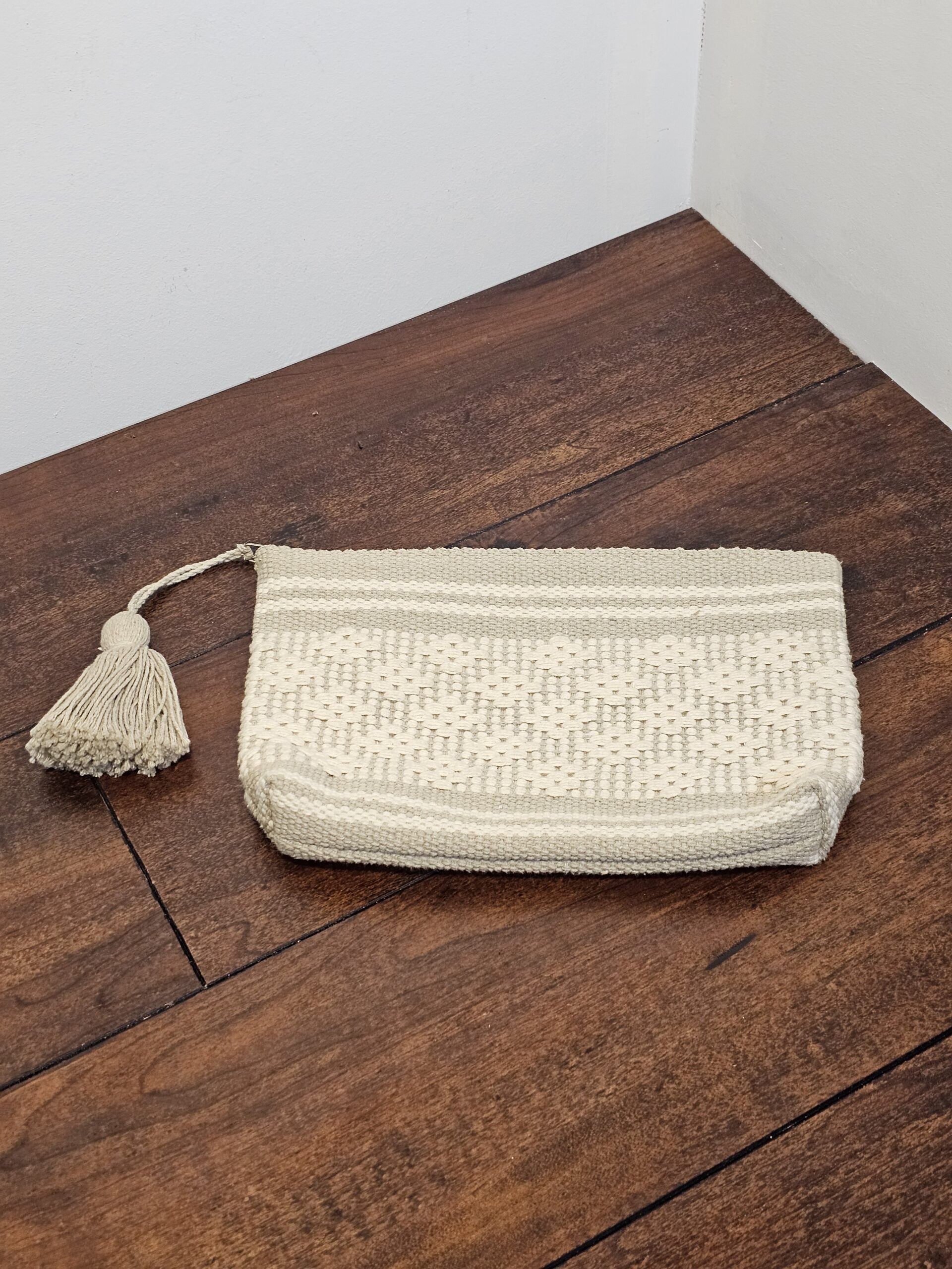 Handwoven Cream Cotton Clutch with Tassel Accent - product image 1