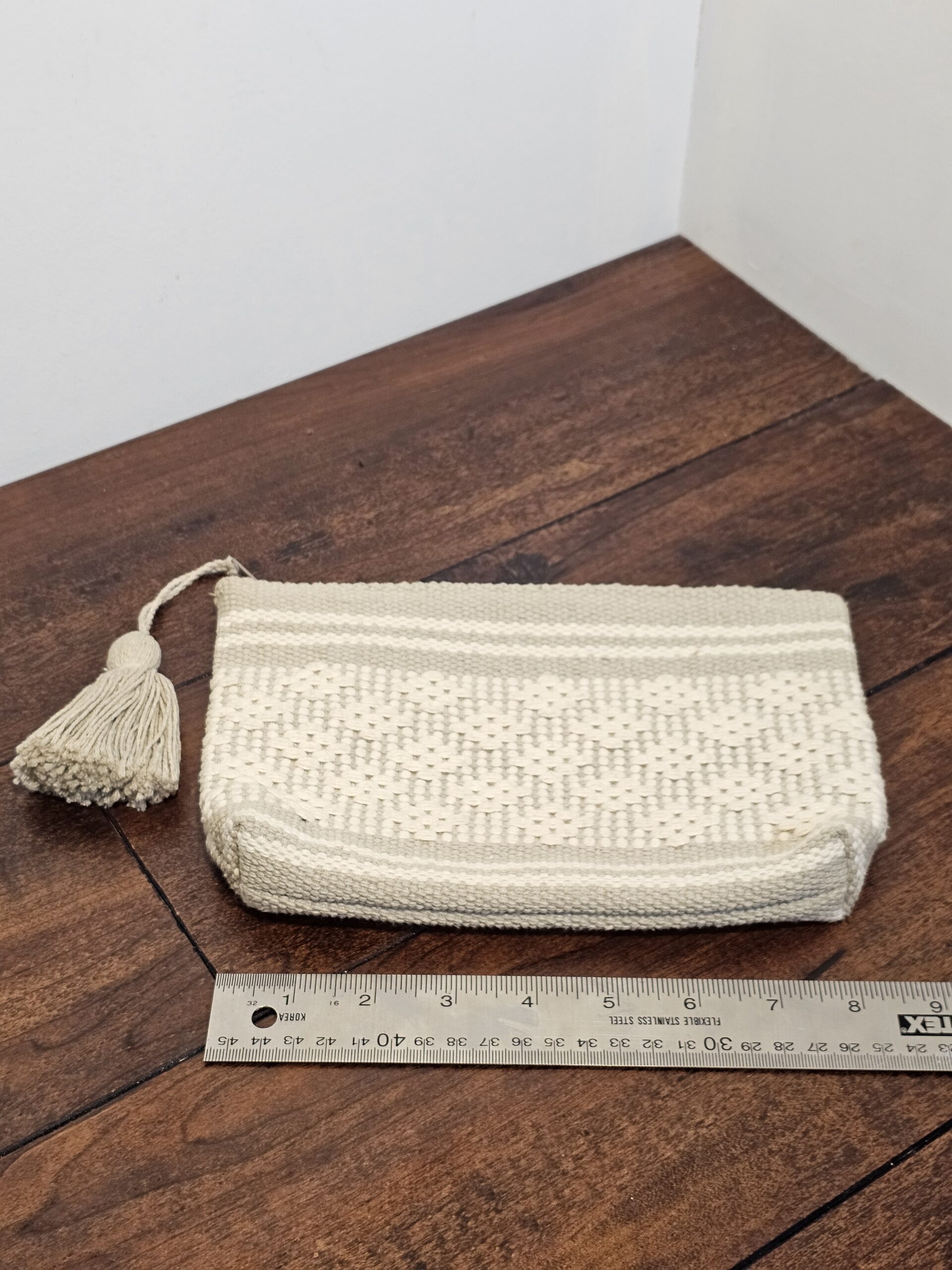 Handwoven Cream Cotton Clutch with Tassel Accent - product image 2