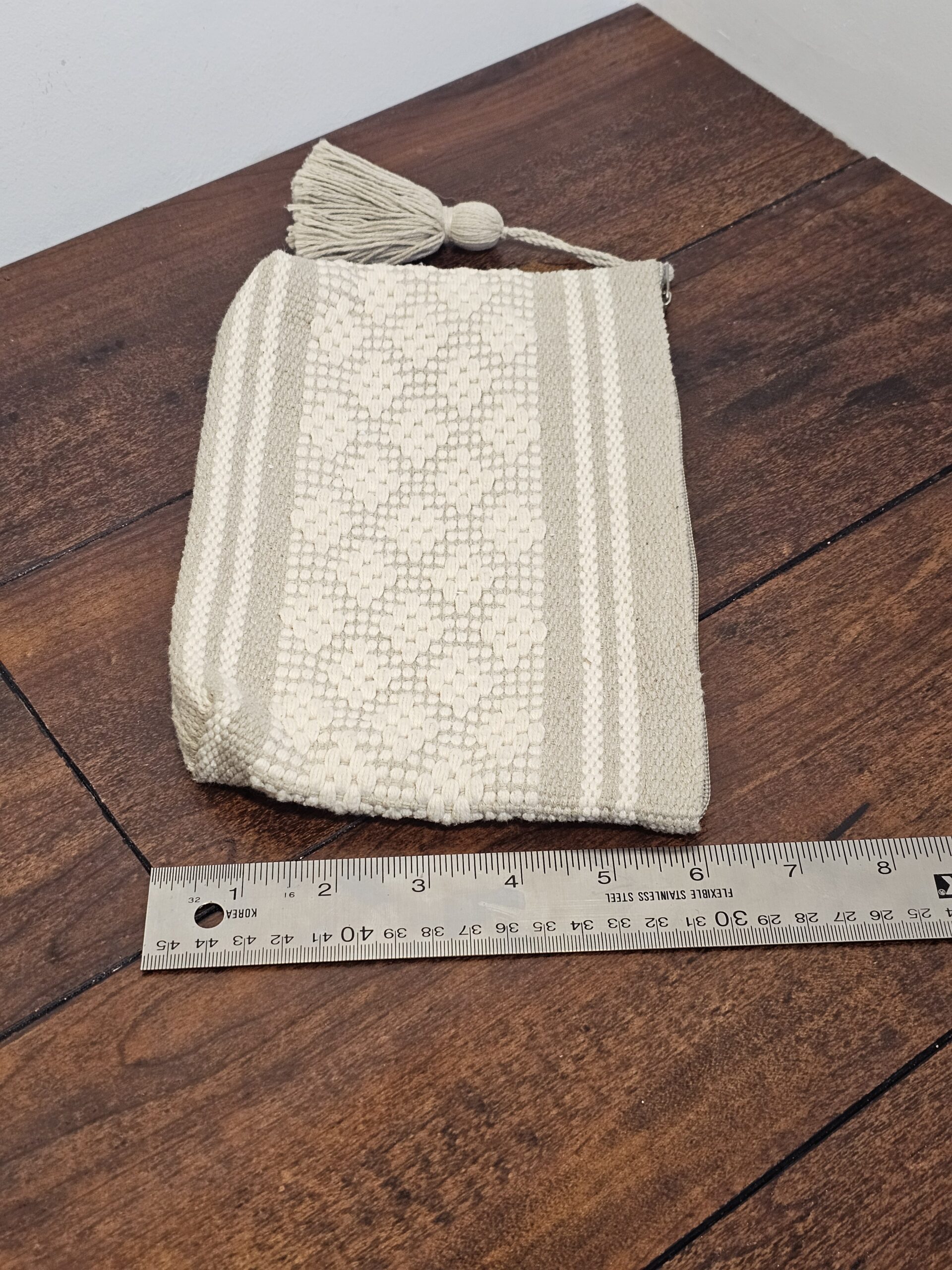 Handwoven Cream Cotton Clutch with Tassel Accent - product image 3
