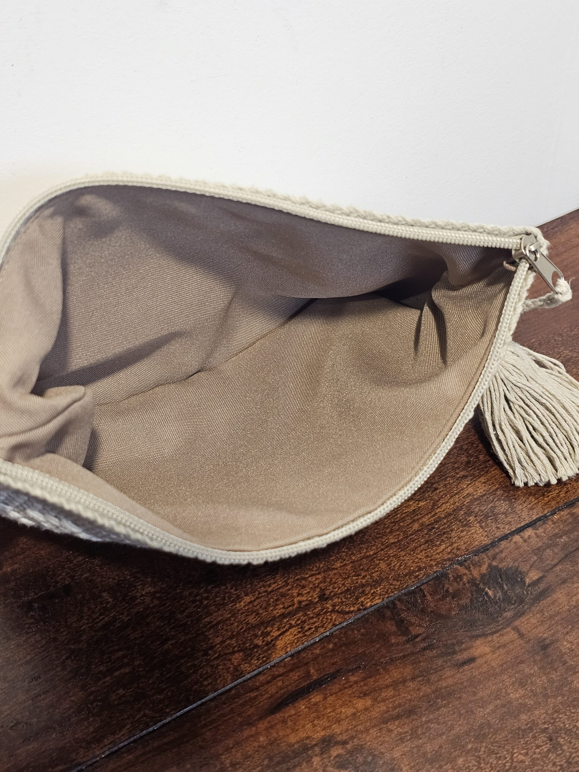 Handwoven Cream Cotton Clutch with Tassel Accent - product image 5