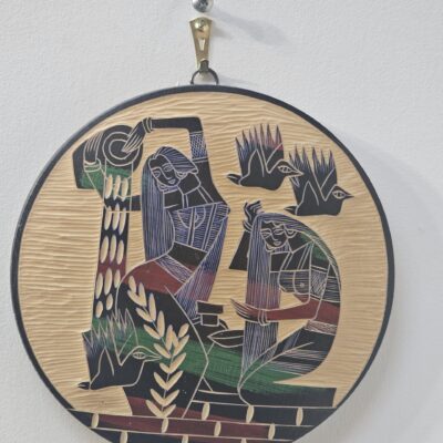 Round Wooden Wall Art with Carved Figures - product image 1