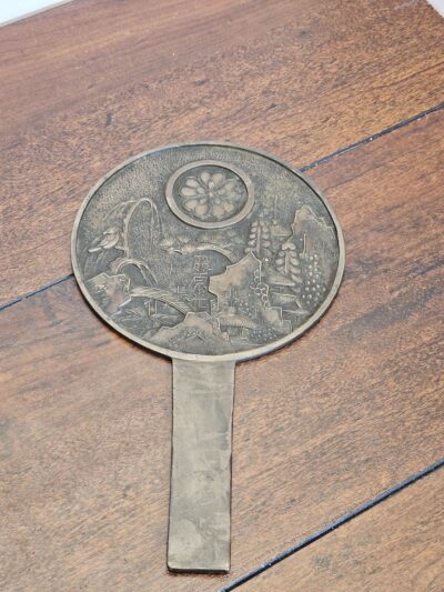 Vintage Japanese Bronze Hand Mirror with Engraved Scenic Design - product image 1