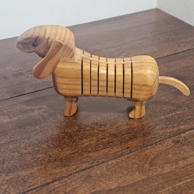 Handcrafted Wooden Dog Figurine with Articulated Body - product image 1